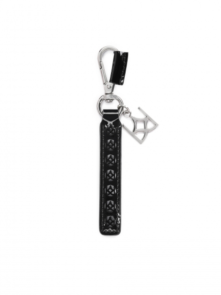 Stilvoller Schlüsselanhänger aus Leder mit einem Metallanhänger 