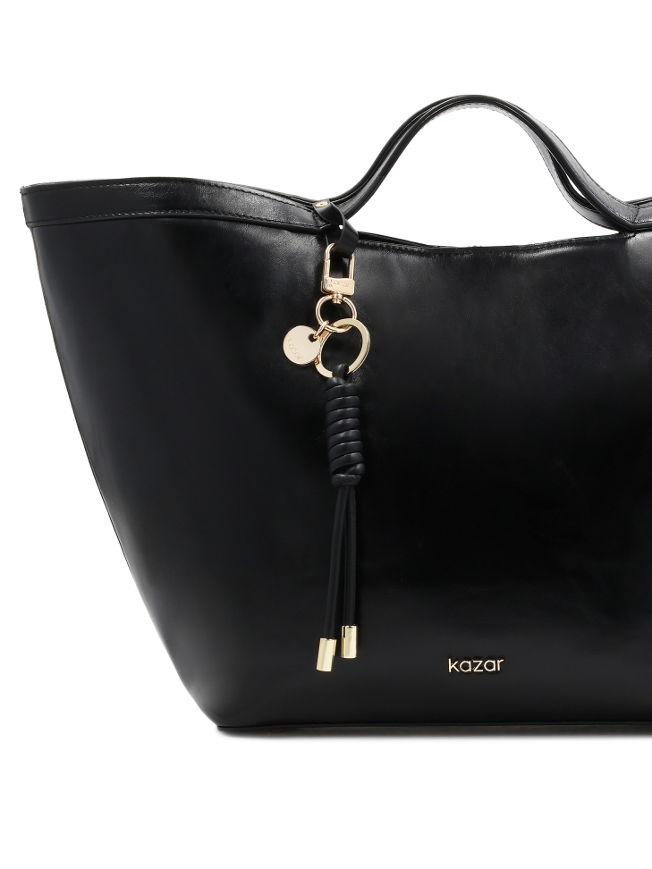 Schlüsselanhänger aus schwarzem Naturleder mit goldenen Details LILYANA