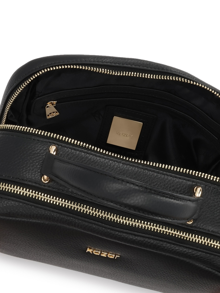 Lederhandtasche mit geometrischer Form NUTE